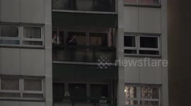 Residents in west London take to their balconies to pay tribute to NHS workers