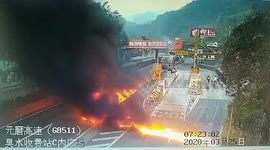 Semi-trailer bursts into flames after crashing into road barriers on Chinese highway