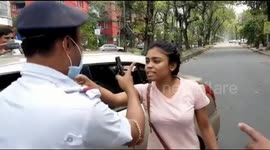 Furious Indian woman LICKS COP after being stopped for defying COVID-19 lockdown
