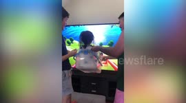 Philippine family keep baby entertained with DIY rollercoaster during COVID-19 lockdown