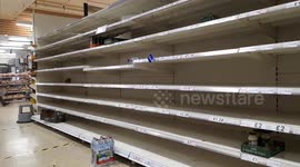Shelves for biscuits and tonic water among those stripped despite item limits for shoppers