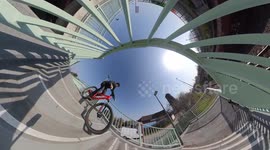 Crazy MTB Bike Athlete rides down stairs on bridge