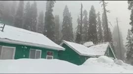 Fresh snowfall covers villages in Indian Kashmir