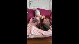 Toddler hangs out with pet cat during lockdown