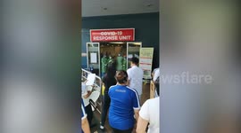 Emotional moment well-wishers sing to doctors and nurses treating coronavirus patients in Philippines