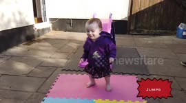 2 year old in isolation demonstrates keep fit
