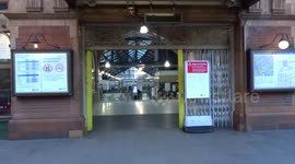 Coronavirus: stay at home - do not travel unless your journey is absolutely essential notice at Earls Court tube station