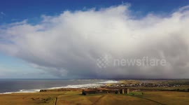 Drone View of Winter Shower With Anvil Over Tourist Location