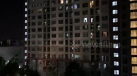 Residents in Bangkok clap to show support for Covid-19 medical workers