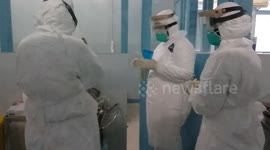 nurse wear safety equipment in coronavirus  isolated room