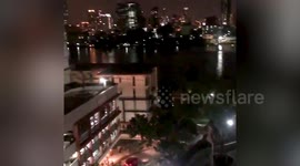 Bangkok residents cheer and clap to show support for COVID-19 medical workers