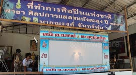 Artist uses traditional puppet show to give Covid-19 warnings in Thailand