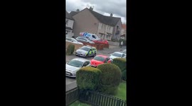 Scottish Elvis impersonator plays gig from balcony amid COVID-19 lockdown