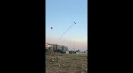 The man can control FOUR beautiful kites flying in the sky at once