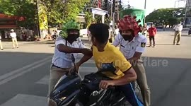 Thespian cops in India act out the dangers of coronavirus