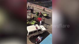 Police personnel upturns vegetable vendors' carts amid nationwide lockdown, later suspended from duty in western India