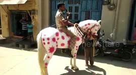 Artistic route: Police rode horse painted with COVID- 19 virus to create awareness among locals in southern India