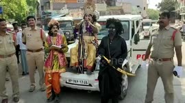People dressed in mythological characters take to streets to spread awareness on coronavirus pandemic in southern India