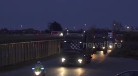 COVID-19: Irish police and army escort PPE from Dublin Airport at night