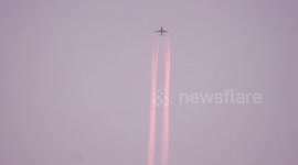 Plane Leaving Flight Trail Behind