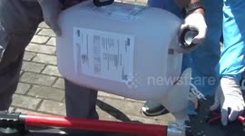 prevent corona virus, Indonesian red cross officers spray disinfectant in monas tourism park, central jakarta,