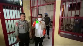 Spraying disinfectants in the Police Detention Room in Makassar, Indonesia