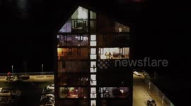 Drone footage shows hundreds of UK residents staging mass isolation disco in their homes