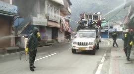 Volunteers sanitize streets and shops amid fear of COVID-19 pandemic in Northern India