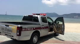 Police warn people to stay off beach in Phuket, Thailand