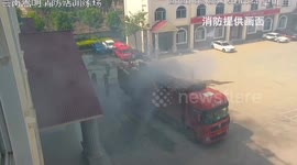 Driver of burning transport truck pulls into Chinese fire station asking for help