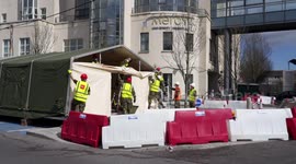 Irish Army set up tents outside Cork hospital to combat COVID-19 pandemic