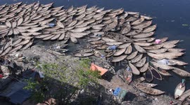 Protective measures in Bangladesh, passenger boats parked on the Buriganga shores.