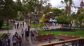 People protesting and marching towards the city center