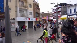People protesting and marching towards the city center