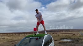 UK golf fanatic turns his car into mobile driving range