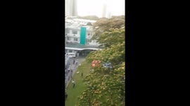 Hundreds of tower block residents cheer Covid-19 medics in hospital next door