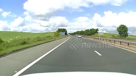 wood on motorway near miss close call danger road