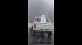 Do you want to drive a snowman? Amusing scene captured on Bosnian road