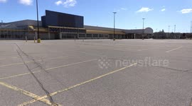 Empty parking lots and closed retail stores and COVID-10 pandemic takes it's toll on millions of businsess and jobs in Ontario Canada