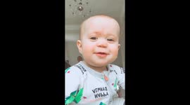 Baby goes viral after stealing the show during mom's home workout videos