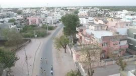 Amid nationwide coronavirus lockdown, police personnel deploy drones to monitor people on arterial and interior roads in western India