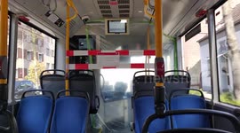German bus drivers isolated behind plastic sheet to prevent during coronavirus pandemic