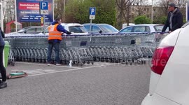 Supermarkets are disinfecting the shopping carts to prevent the spread of the COVID-19 Coronavirus