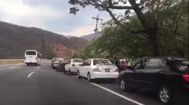 Venezuelans queue for miles at petrol stations amid crisis