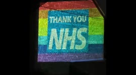 Covid 19 coronavirus NHS UK giant mural projection in wallasey