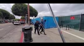 Cop's sould have on mask arresting people  bridge housing at venice
