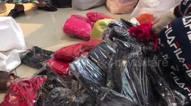 Doctors distribute protective masks to drivers in Indonesia