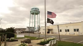 Jersey Shore: Flags in beach town fly at half-staff in empty parking lot during COVID-19 pandemic