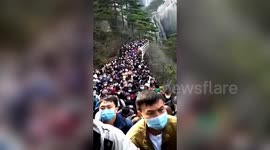 Chinese scenic spot swamped with 20,000 tourists as coronavirus outbreak slows