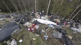 Tonnes of rubbish has been dumped over the edge of a lay-by